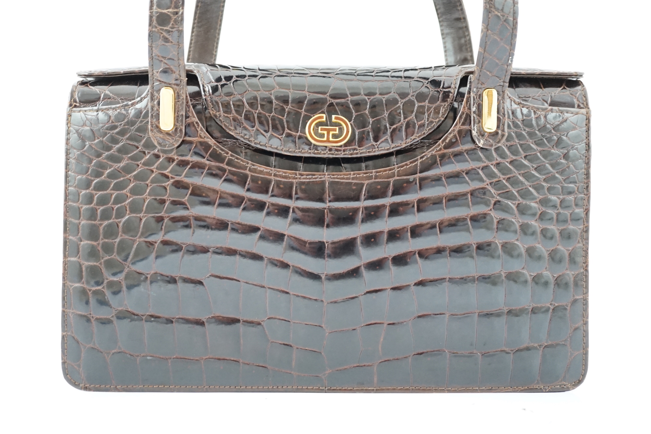 A lady's vintage brown crocodile handbag height 20cm, height to handles 33cm, width 32cm, depth 6cm